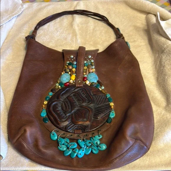 Brown and Blue Hobo Bag with Circular Embellishment - Picture 1 of 5